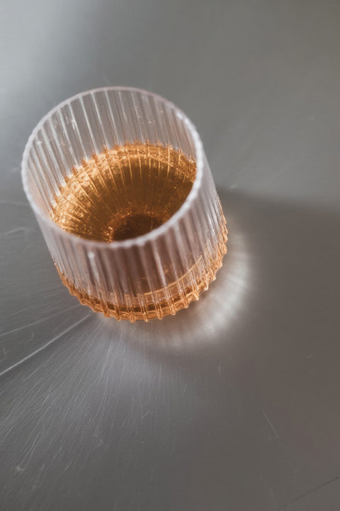 Djuce Studio Unbreakable Wine Glass on an aluminium surface