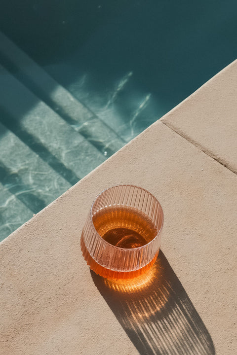 Djuce Studio's wine glasses enhancing guest experiences in a hospitality setting.